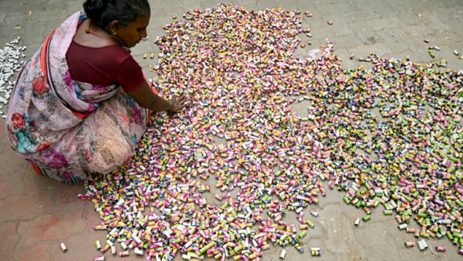 Indian workers prepare fireworks ready for the Hindu festival of Diwali on November 1 -- but the capital New Delhi has ordered a complete ban to try to curb air pollution 