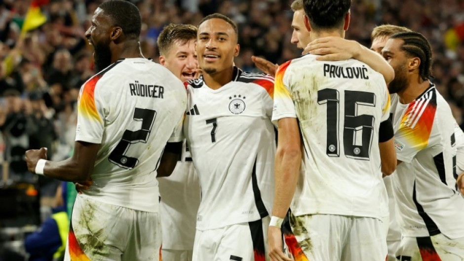 Germany's number seven Jamie Leweling celebrates with teammates after scoring against the Netherlands