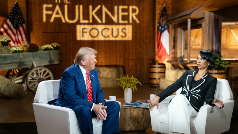 Donald Trump with Fox News broadcaster Harris Faulkner for a townhall event in Cumming, Georgia