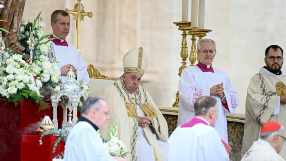 Pope Francis (C) presided over the canonisation ceremony in Saint Peter's Square in the presence of thousands of Catholic faithful from around the world