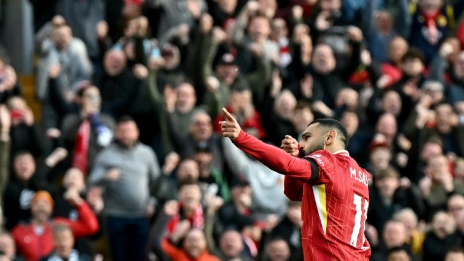 Mohamed Salah celebrates scoring in Liverpool's 2-1 win over Chelsea