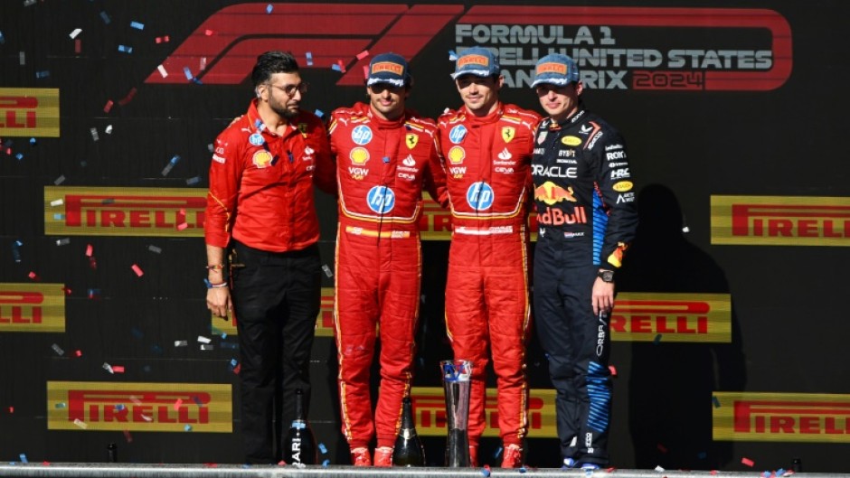 Victory line-up: Charles Leclerc and Carlos Sainz with Max Verstappen on the podium 
