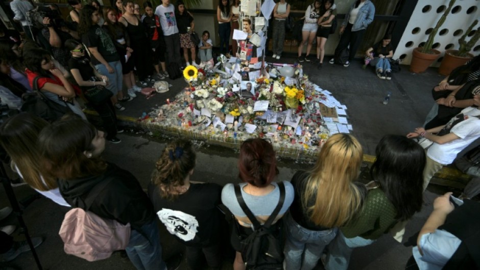 Fans have paid tribute to British singer Liam Payne in front of the hotel where he died in Buenos Aires 