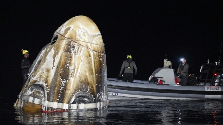 The SpaceX Dragon Endeavour spacecraft shortly after splashing down in the Gulf of Mexico off Florida