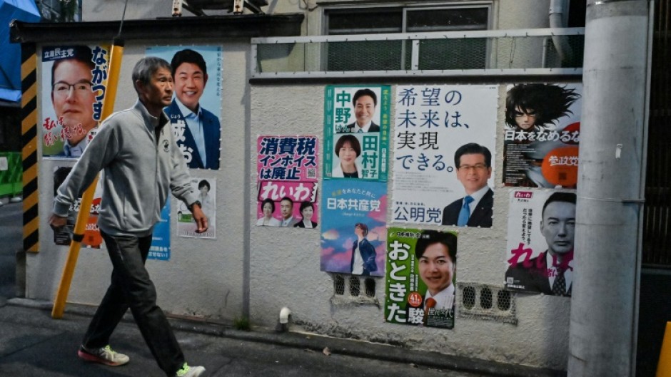 Candidates in Japan's super-tight election will make last-ditch appeals to voters on Saturday