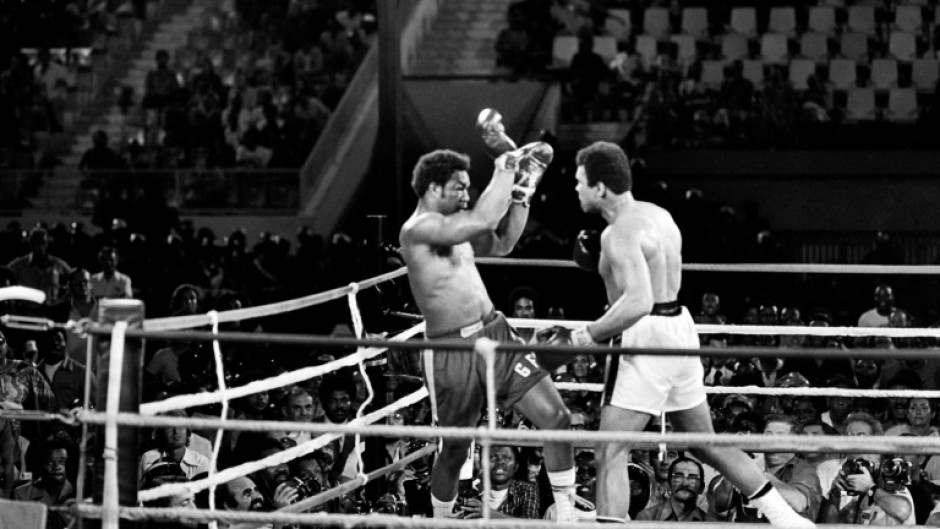 Muhammad Ali (R) goes toe to toe with George Foreman in the Rumble in the Jungle on October 30, 1974