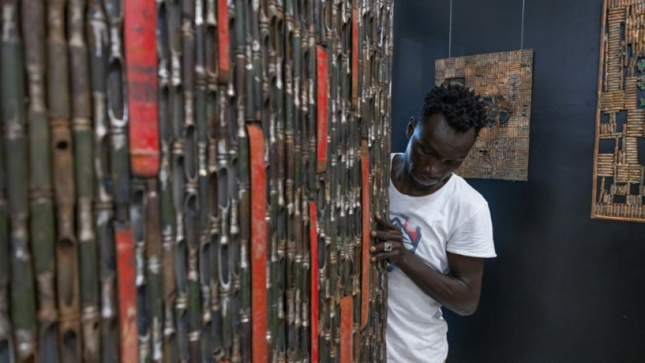 Chad's most influential visual artist, whose real name is Appolinaire Guidimbaye, welcomed visitors for the first time last week at his gallery opening