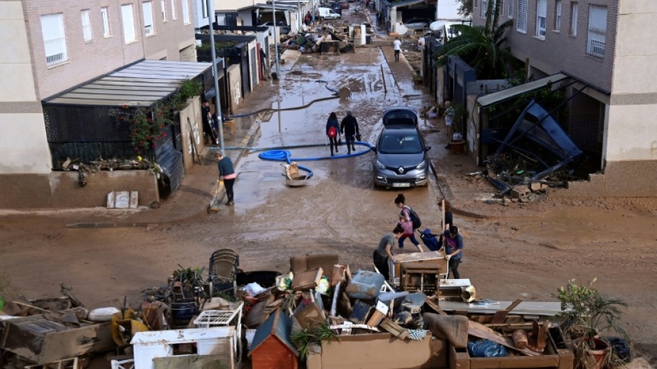 The floods have tossed vehicles, collapsed bridges and covered towns with mud