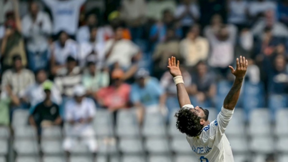 India spinner Ravindra Jadeja celebrates after removing New Zealand's Will Young for 71 in Mumbai