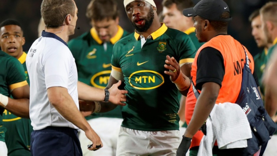 On the bench: South Africa captain Siya Kolisi (C) 