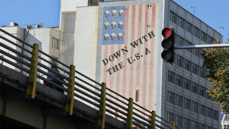 A large anti-US mural painted on the wall of a building in central Tehran