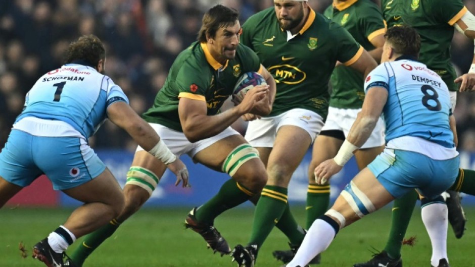 Leading from the front: South Africa captain Eben Etzebeth (C) makes a break against Scotland at Murrayfield