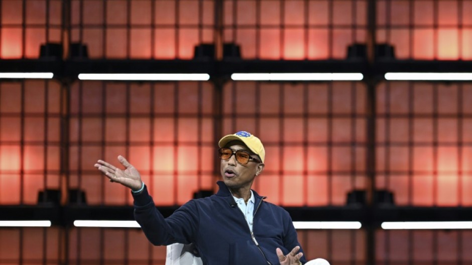 US singer Pharrell Williams brought star power to the event's opening on Monday night