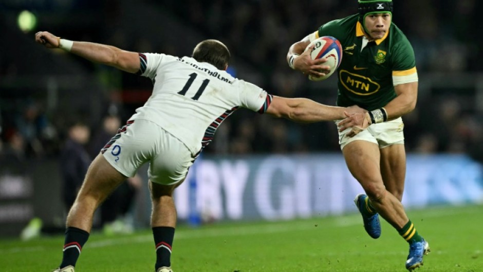 Show and go: South Africa wing Cheslin Kolbe (R) side-steps Ollie Sleightholme to score the first of his two tries in a 29-20 win over England at Twickenham 