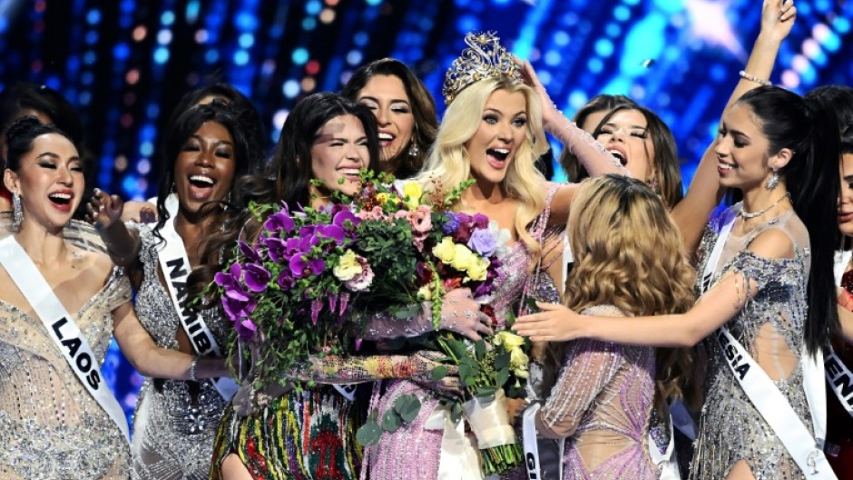 The newly crowned Miss Universe 2024, Victoria Kjaer Theilvig (C) from Denmark is a dancer and animal rights activist