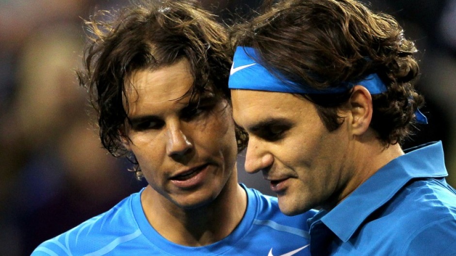 Rafael Nadal (L) had a 24-16 winning record in his head-to-head meeetings with Roger Federer (R), seen here in 2012