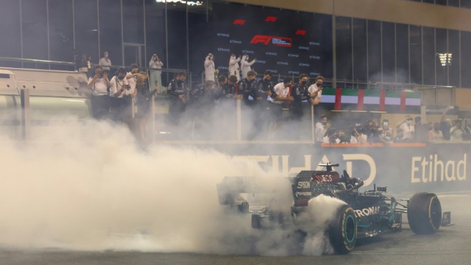 Lewis Hamilton does doughnuts after the Covid-19 affected season closer in Abu Dhabi - his seventh world title