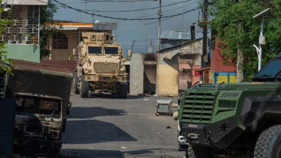 A Kenyan police armored vehicle patrols the Solino district in Port-au-Prince on November 16, 2024