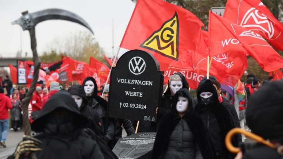 Volkswagen workers staged a colourful protest against planned cost cuts