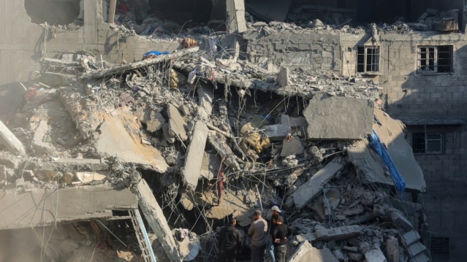 The aftermath of an Israeli strike south of Gaza City 