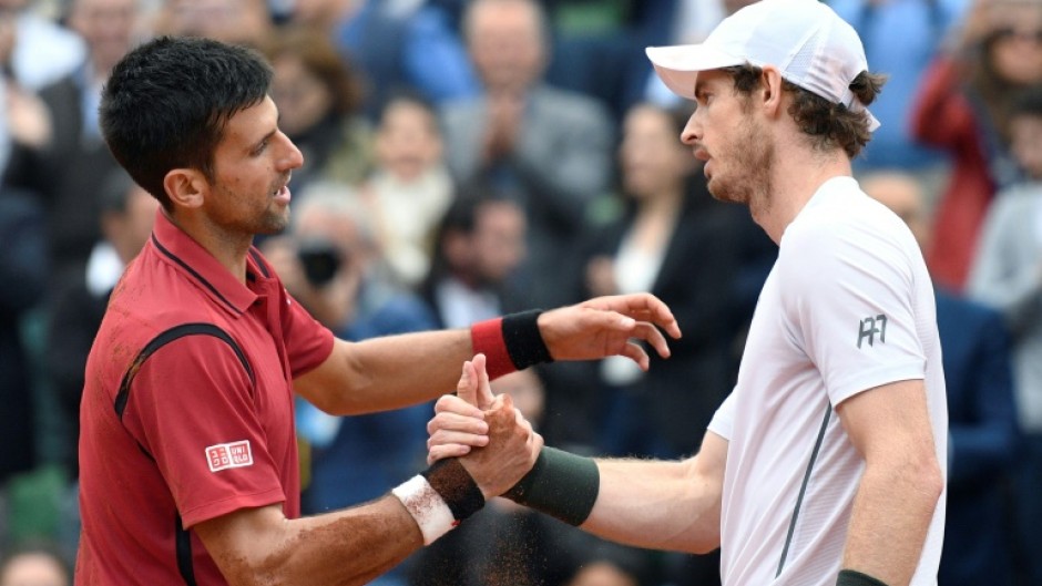 Novak Djokovic shakes hands with Andy Murray when the Briton was still playing -- he is now joining the Serb's coaching team