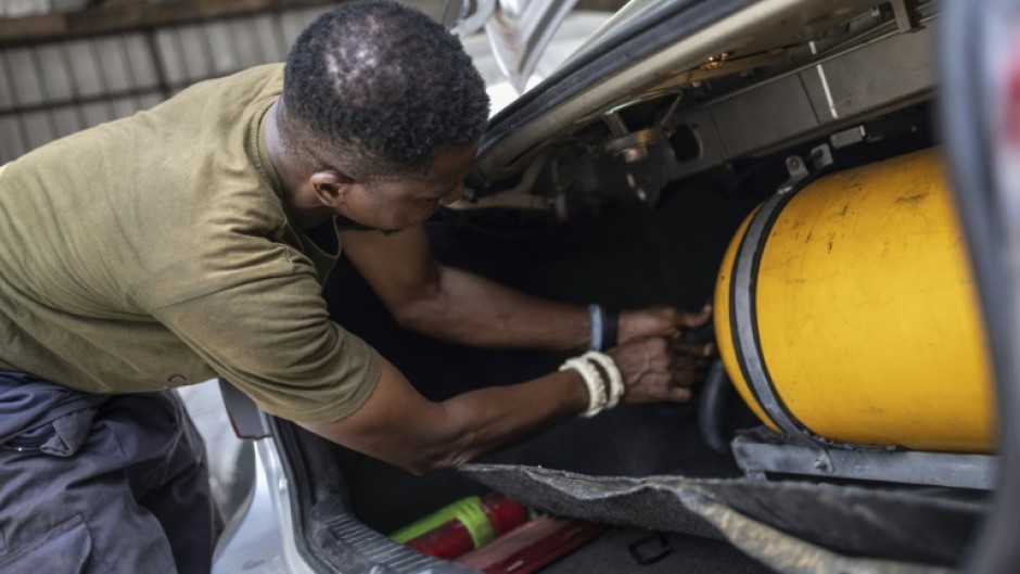 Faced with soaring petrol prices after an end to fuel subsidies, some Nigerians are convertng their cars to run on compressed natural gas