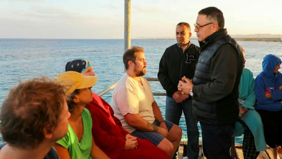 Red Sea governor Amr Hanafi visited survivors rescued from a capsized vessel in the Red Sea harbour town of Marsa Alam