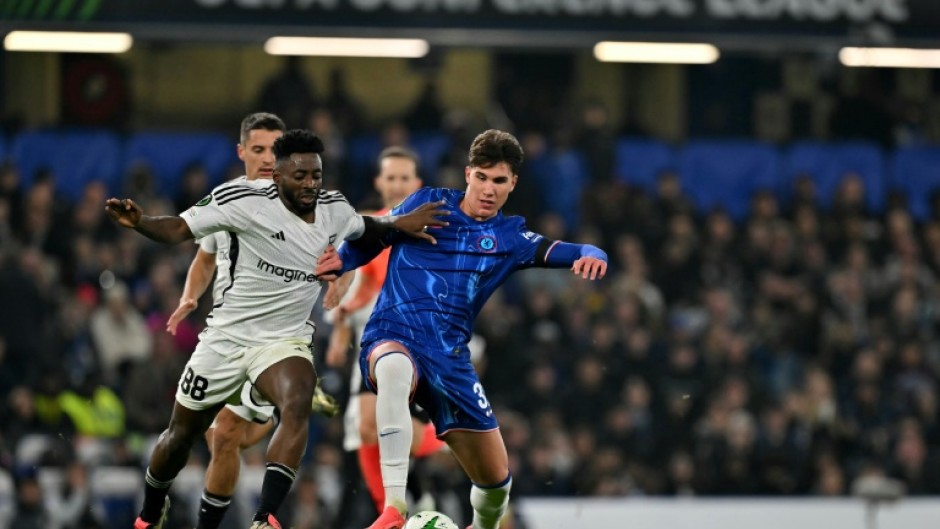 Chelsea midfielder  Cesare Casadei (R) battles for the ball in the UEFA Conference League