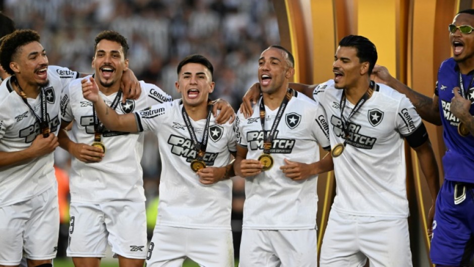 Botafogo players celebrate after winning the Copa Libertadores final over fellow Brazilian club Atletico Mineiro