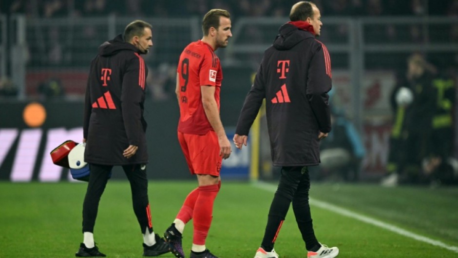 Bayern Munich's English forward Harry Kane (C) suffered a hamstring injury during Saturday's 1-1 Bundesliga draw at Borussia Dortmund