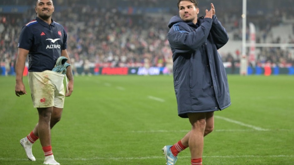 Peato Mauvaka (L) and Antoine Dupont (R) celebrate France's win over Japan in November