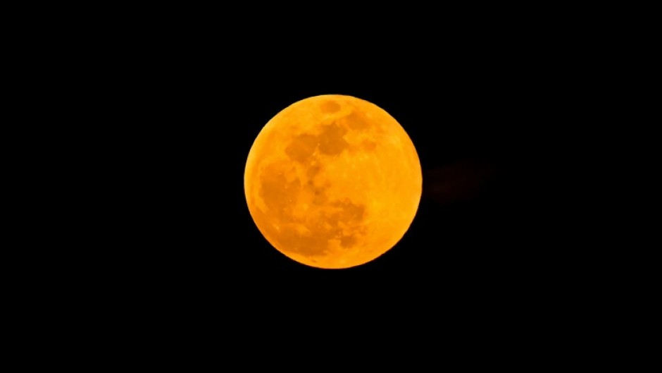 A supermoon rises over Singapore on October 17, 2024