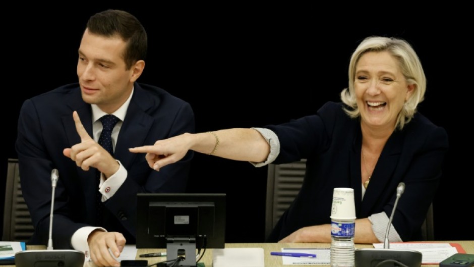 Far-right leaders Jordan Bardella (L) and Marine Le Pen (R) have demanded talks with the future prime minister