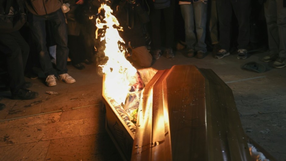 The night before set on fire an effigy of billionaire Bidzina Ivanishvili, widely believed to be pulling the strings of power