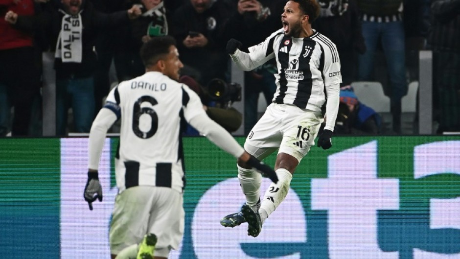 Weston McKennie (R) celebrates after scoring to give Juventus a 2-0 lead against Manchester City in Turin