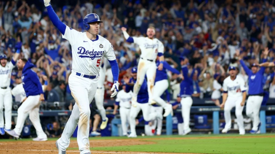 Freddie Freeman's World Series grand slam walk-off baseball has sold for $1.56 million at auction