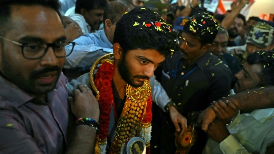 India's Gukesh Dommaraju  returned to a hero's welcome in his home city on Monday