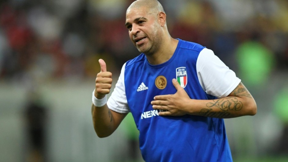 Ex-Brazilian player Adriano during his friendly farewell match with legends of Brazil's Flamengo and Italy's Inter Milan at the Maracana Stadium in Rio