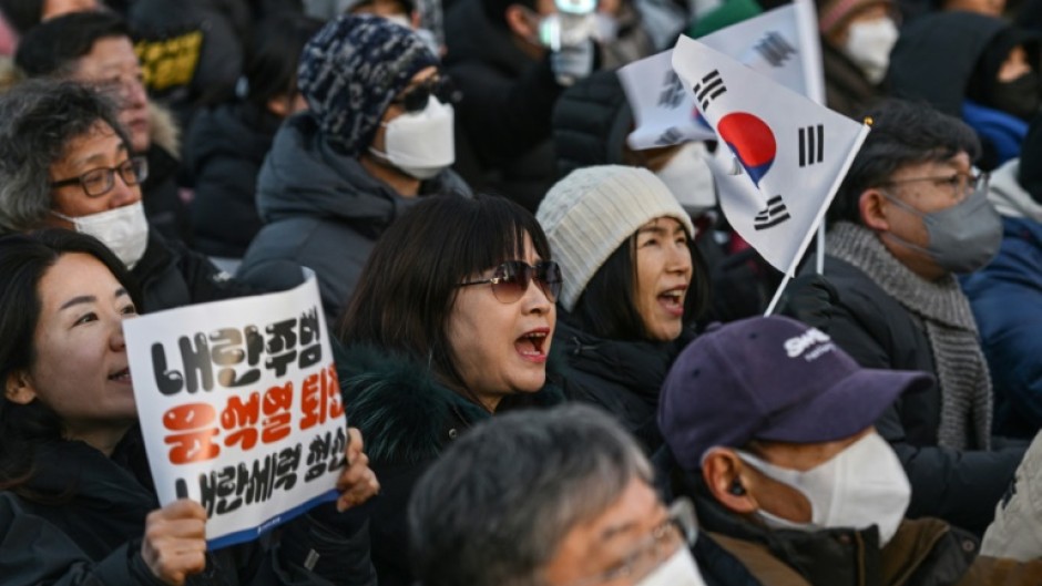 Seoul police estimated at least 200,000 people had gathered outside parliament in support of removing President Yoon Suk Yeol