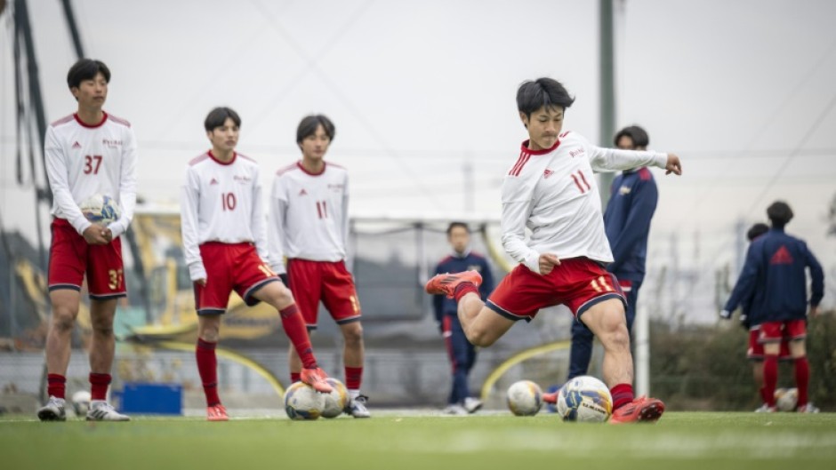 Ryutsukeizai University Kashiwa High School football club train for the annual tournament which is is thriving after more than 100 years, attracting huge crowds, millions watching on TV and breeding future stars