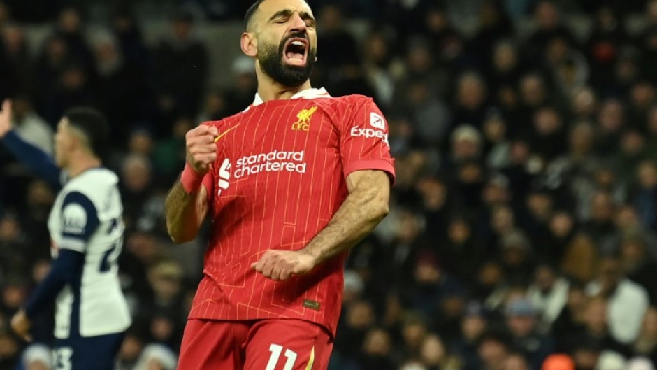 Liverpool's Mohamed Salah celebrates after scoring against Tottenham