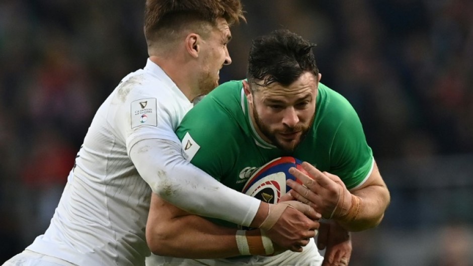 Ireland centre Robbie Henshaw in action against England