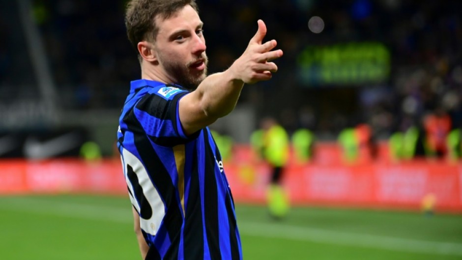 Carlos Augusto celebrates after scoring for Inter Milan in the win over Como