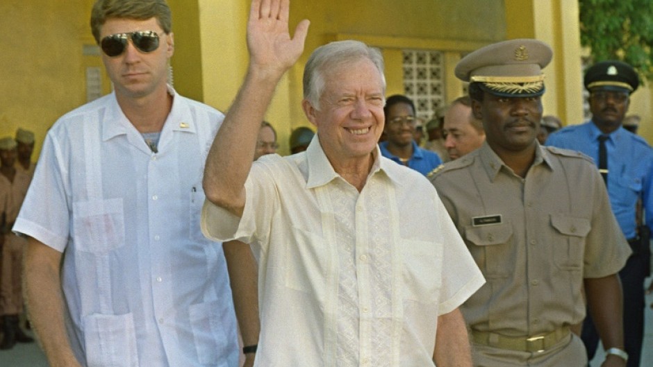 Former president Carter traveled to Port-au-Prince to meet with electoral authorities about Haiti's December 1990 general elections