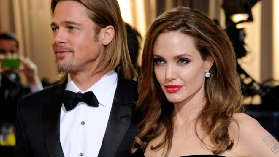 Brad Pitt and Angelina Jolie have signed off on a divorce settlement