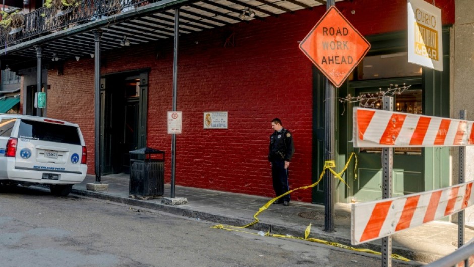 The French Quarter, near Bourbon Street, is blocked off by a heavy police and FBI presence after a truck plowed into a crowd of New Year's revelers, killing 15