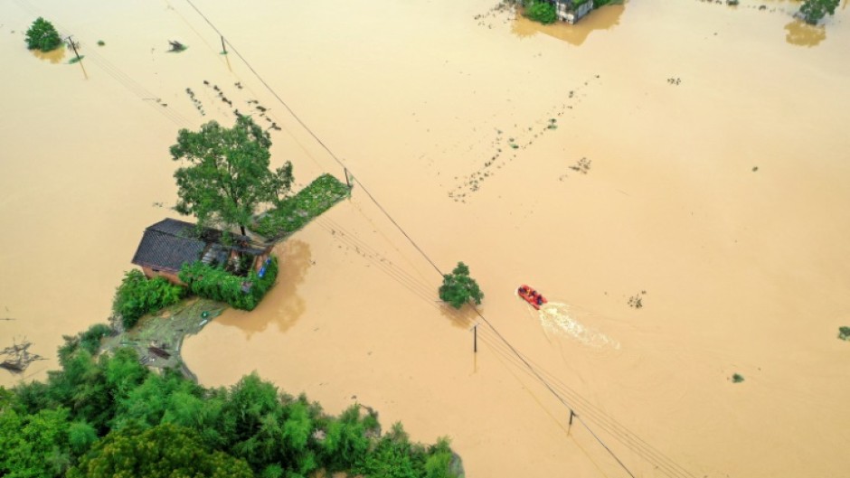 In July, heavy rains caused by Typhoon Gaemi flooded villages in China's Hunan province                