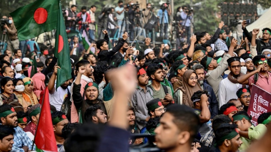 Students and supporters shout slogans during a 'March for Unity' organised by the Anti-Discrimination Student Movement in Dhaka on New Year's eve