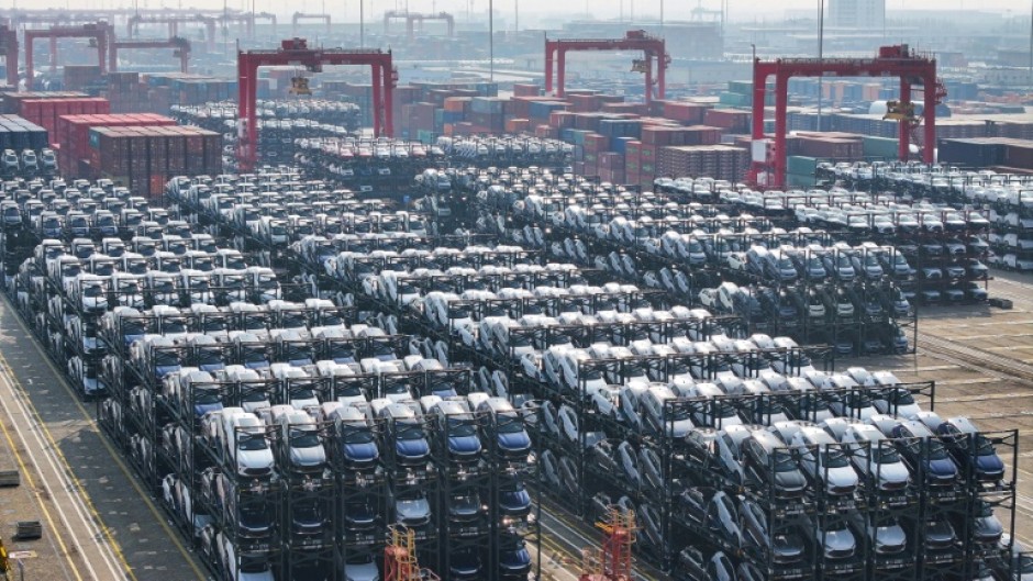 BYD electric cars waiting to be loaded onto a ship for export at the international container terminal of Taicang Port in Suzhouin February 2024