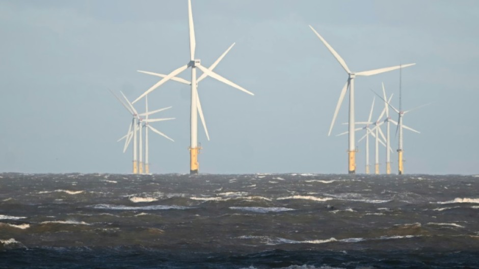 Turbines like these off the coast of Wales are expected to help wind power become Britain's largest source of electricity in 2025